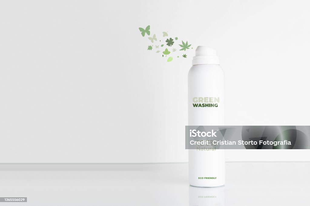 Greenwashing concept: deodorant bottle decorated to look environmentally friendly Greenwashing Stock Photo