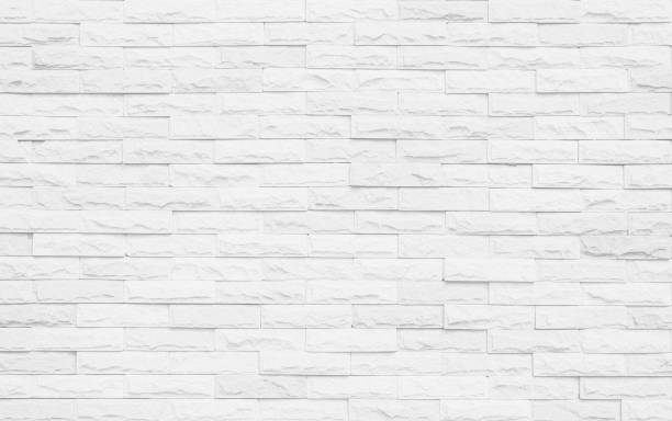 istock White grunge brick wall texture background for stone tile block painted in grey light color wallpaper modern interior and exterior and room backdrop design 1365556191