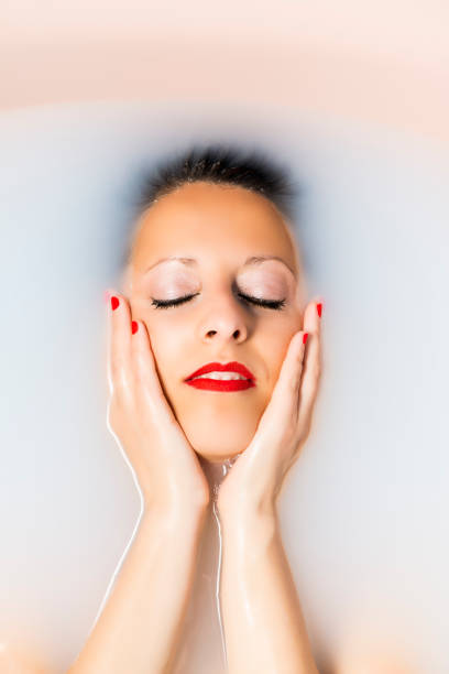 istock A woman taking a milk bath. 1365561672