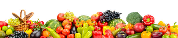 istock Wide pattern from vegetables and fruits isolated on white background 1365561713