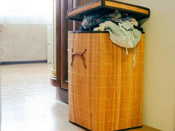 istock laundry basket, large wash, overflowing laundry basket 1365562379