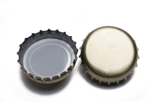istock Closeup crown caps top bottom white background 1365564053