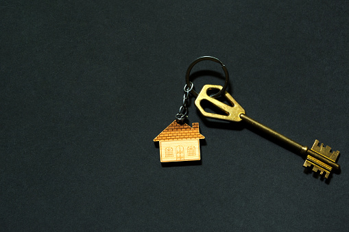 House shaped keyring on the door