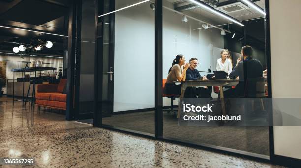Business Colleagues Having A Meeting In A Boardroom Stock Photo - Download Image Now