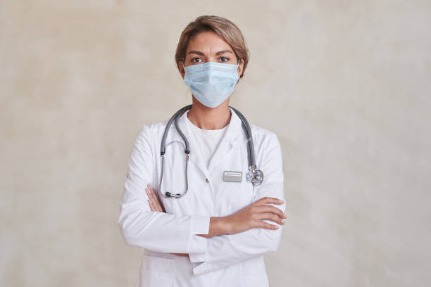 istock Confident Doctor In Mask 1365568852