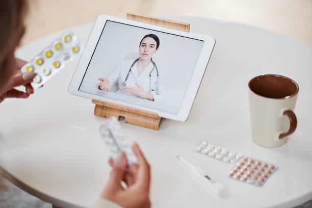 istock Talking To Doctor On Video Call 1365570858
