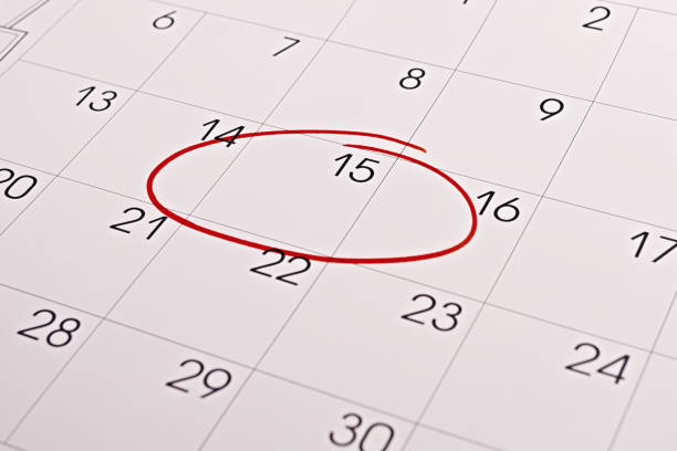 Focus on number 15 in calendar and empty red circle for design in your ideas and work concept