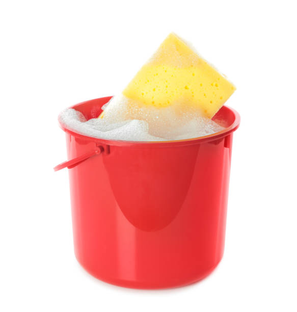 Plastic bucket with foam and sponge isolated on white. Cleaning supplies Plastic bucket with foam and sponge isolated on white. Cleaning supplies bucket and sponge stock pictures, royalty-free photos & images