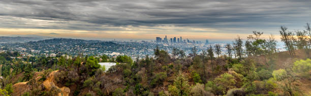 istock Dark clouds over Los Angeles seen from Bronson Canyon 1365573498