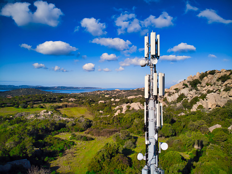 Cell phone communication antenna  tower with rural countryside landscape