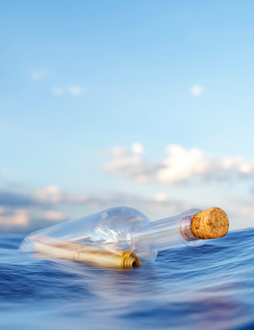 Message in a glass bottle floating on the ocean 3d render