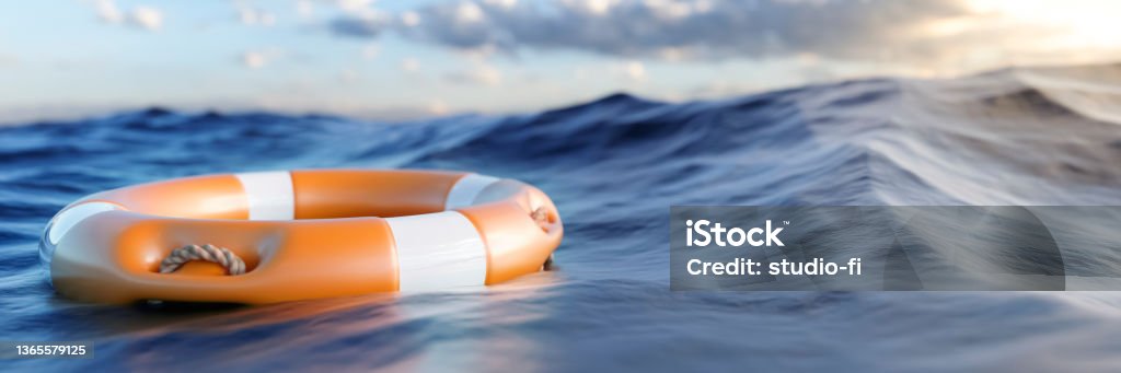 Orange rescue ring floating in the sea 3d render Orange rescue ring floating on large waves in the ocean 3d render panoramic Rescue Stock Photo