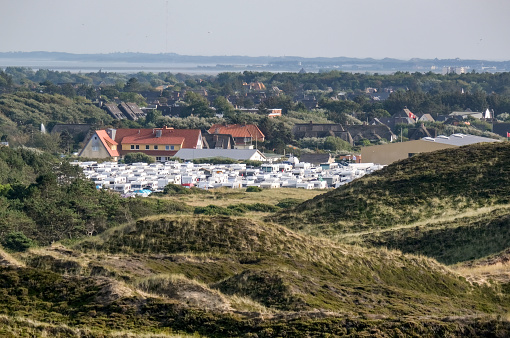 Aerial view: View from above of Germany’s northernmost campsite in the village of Kampen on the island of Sylt in the midst of green nature and dune landscape