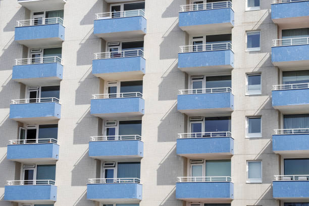 istock Mass tourism concept: Facade of a large hotel complex or holiday home complex in a holiday resort 1365581901