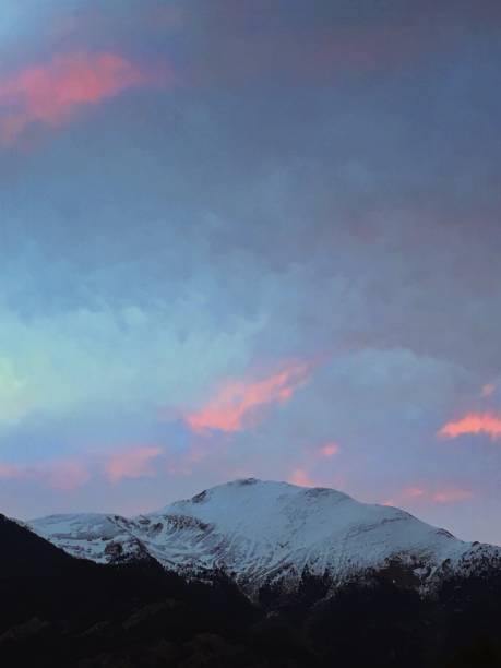 istock Sunrise and snowy landscape 1365587575