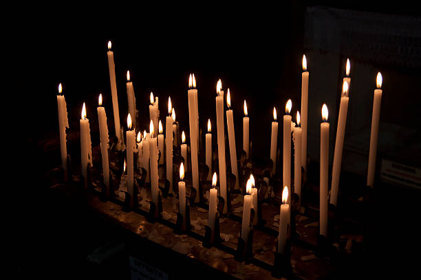 istock Candles in a Church, Black Background 136558813