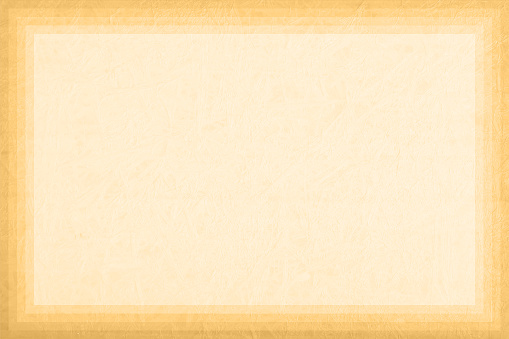 Old grunge effect paper or faded look light brown textured background - suitable to use as backgrounds, vintage post cards, letters, manuscripts, website templates. There is a darker gradient shading border at all the edges. There is no people, no text and ample copy space.