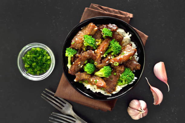 istock Beef and broccoli stir fry with rice 1365595476