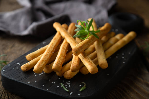 istock Crispy bread sticks with salt and rosemary 1365595688