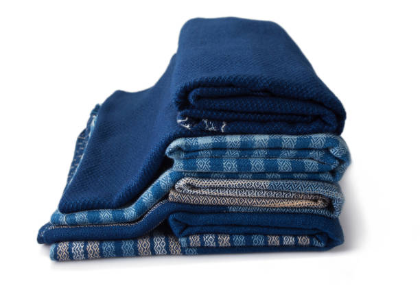 istock Stacks of hand woven shawls, Thai cotton indigo dyed 1365598311