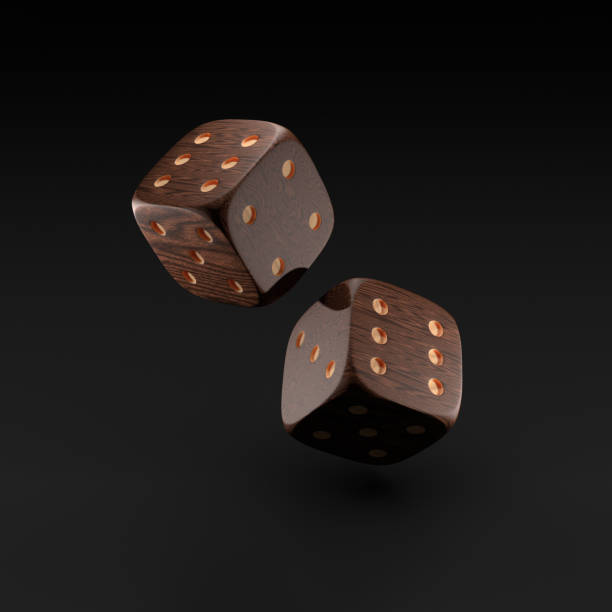 istock wooden dice on a black background. 3d rendering 1365598316