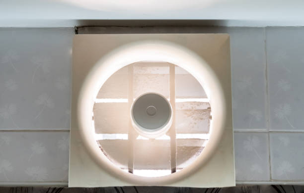 istock The old ventilation fan is working on the wall over the kitchen door. 1365601099