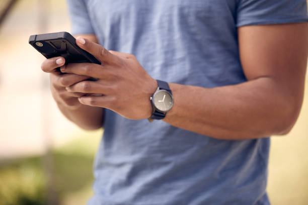 istock Shot of an unrecognisable man using a smartphone outside at college 1365601581