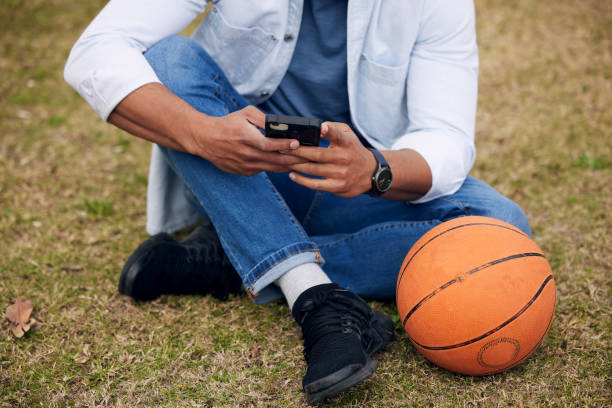 istock Shot of an unrecognisable man using a smartphone outside at college 1365601766