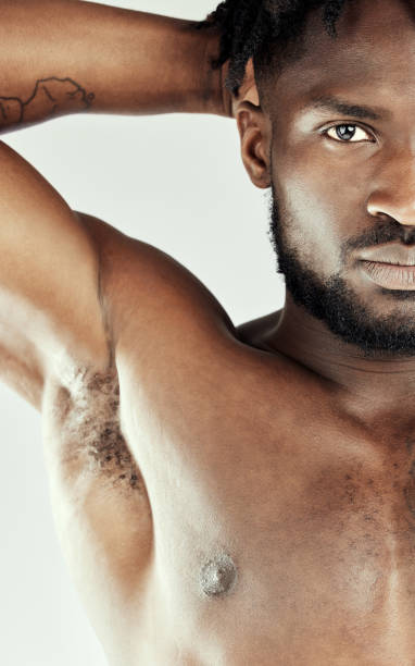 istock Studio shot of a muscular young man posing shirtless 1365604367
