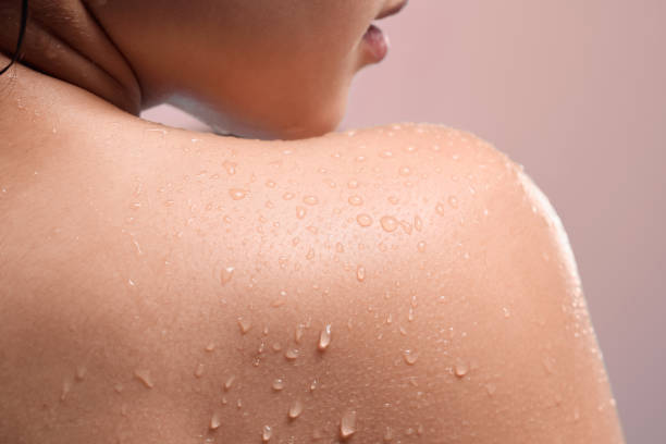istock Shot of a womans back against a studio background 1365605908