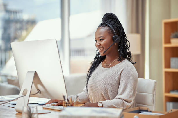 istock Shot of a young businesswoman using a computer while working from home 1365606797
