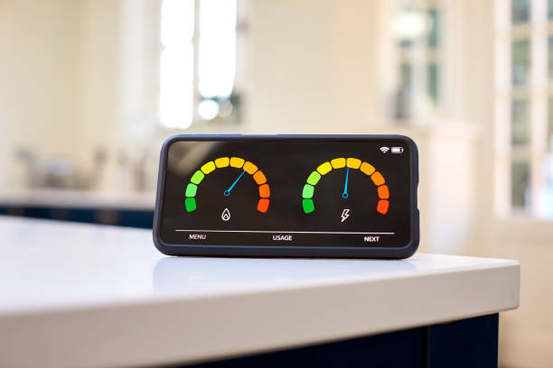 Smart Energy Meter In Kitchen Measuring Consumption Of Domestic Electricity And Gas stock photo