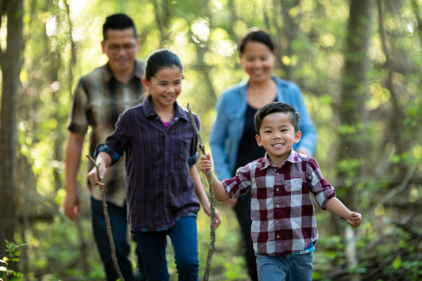 istock Asian Family Hiking 1365614655
