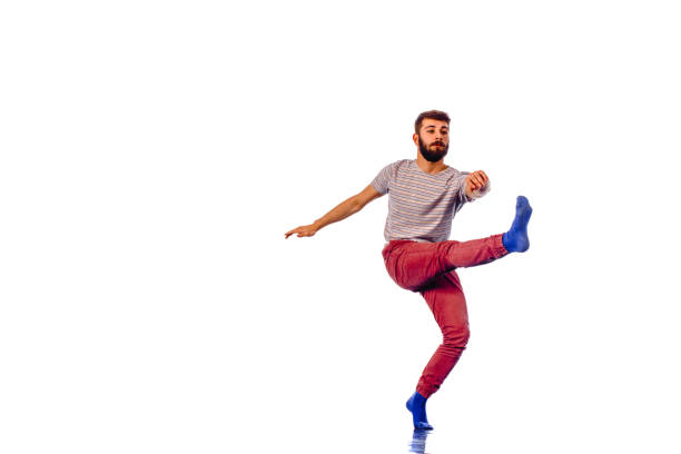 istock Full length of stylish young man dancing 1365615756