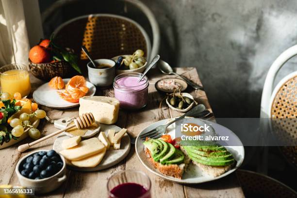 Variety Of Healthy Food On Breakfast Table Stock Photo - Download Image Now - Breakfast, Healthy Eating, Healthy Lifestyle