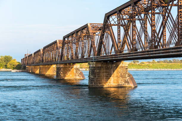 istock Steel railroad bridge over a river 1365616426