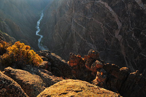 Sunset on the geological veins on the deep and sheer walls of the Black Canyon of the Gunnison National Park, Colorado, USA