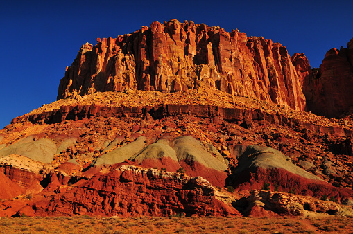 Sunrise on the spectacular geological layers on the Scenic Drive of Capitol Reef National Park, Utah, Southwest USA