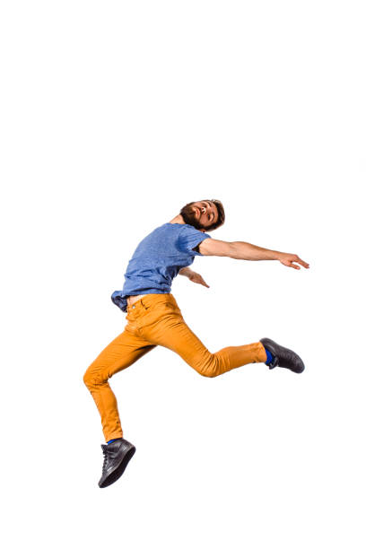 istock Hip hop style dancer performing jump 1365617109