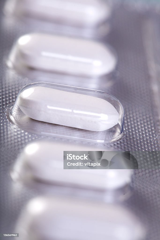 Close up of a pain killer in package Close up on a pill Alternative Therapy Stock Photo