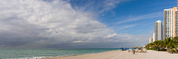 istock Storm clouds moving toward sunny Miami Beach Florida 136561978