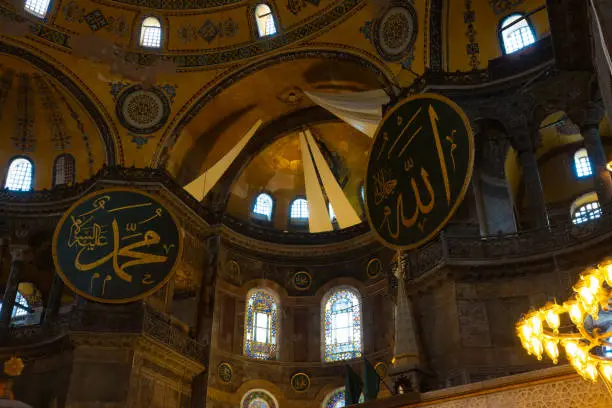 Calligraphies of the God (Allah) and Prophet Mohammad (Muhammed) in Hagia Sophia. Ramadan, kandil, laylat al-qadr or islamic background photo.