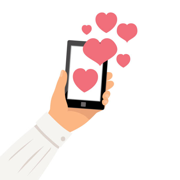 istock Mans Hand Holding A cell Phone With Hearts On A Transparent Background 1365621588
