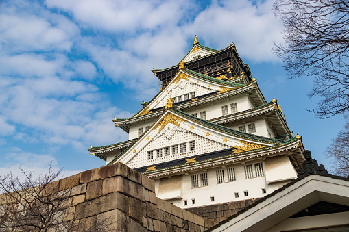 Osaka, Japan - January 20, 2020: A picture of the Osaka Castle and taken from the square below.