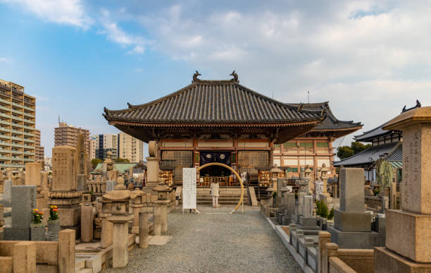 Shitenno-ji Cemetery Osaka, Japan - January 20, 2020: A picture of the Shitenno-ji Cemetery, in Osaka. shitenno ji stock pictures, royalty-free photos & images