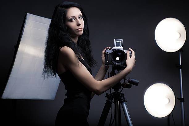 istock Stylish woman photographer 136562533