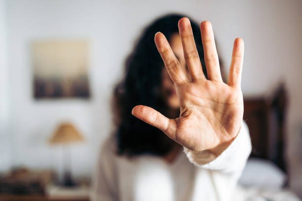 istock Unrecognizable young woman making a stop sign with her hand 1365626711