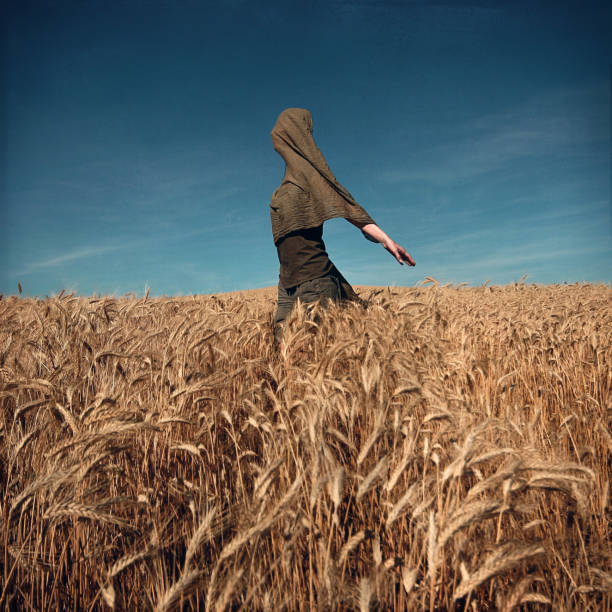 Shape of a woman into a field