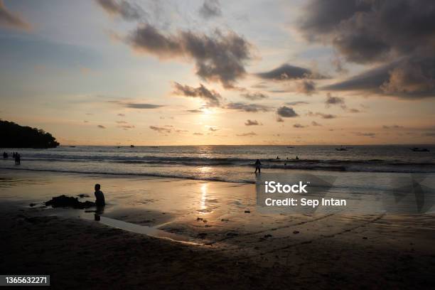 Sunset View On Pangandaran Beach Stock Photo - Download Image Now - Beach, Beauty In Nature, Cloud - Sky