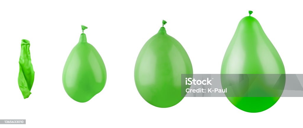 Inflation stages of green balloons. Photographic concept. Balloon Stock Photo